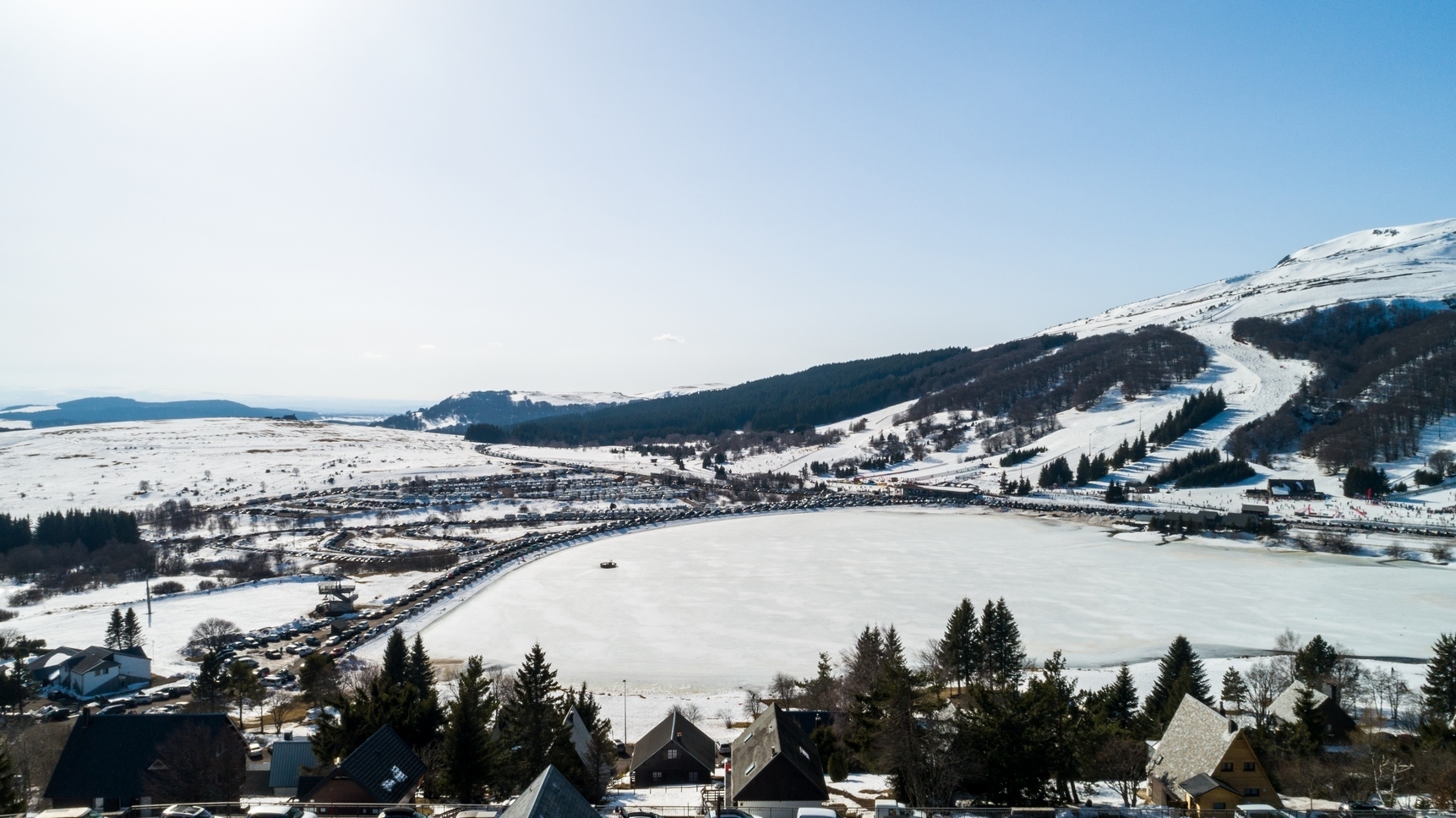 Magnificent view of Lac des Hermines from the balcony of Chalet Cascade in Super Besse