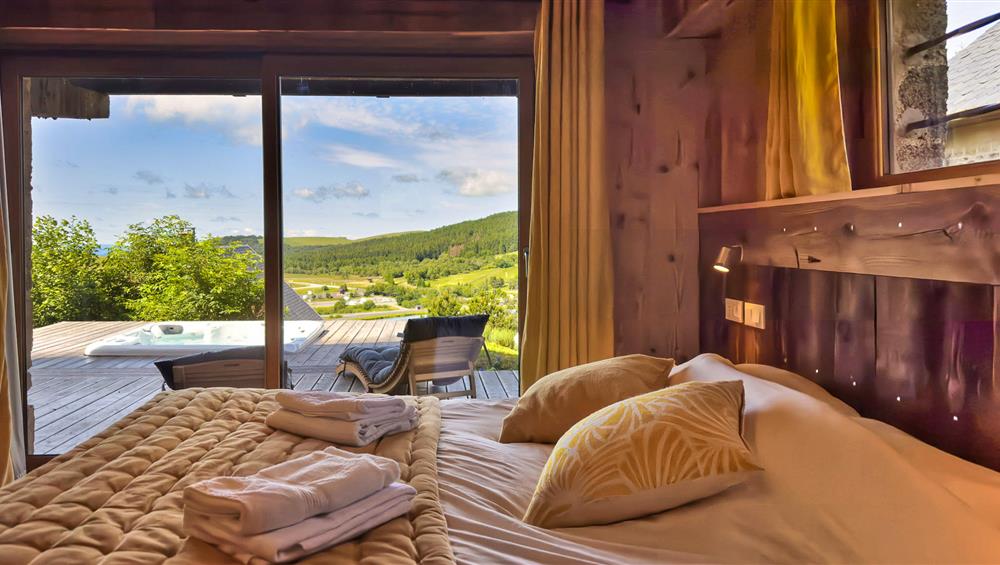 Chalet Cascade Super Besse, chambre double la Cascade, terrasse et spa